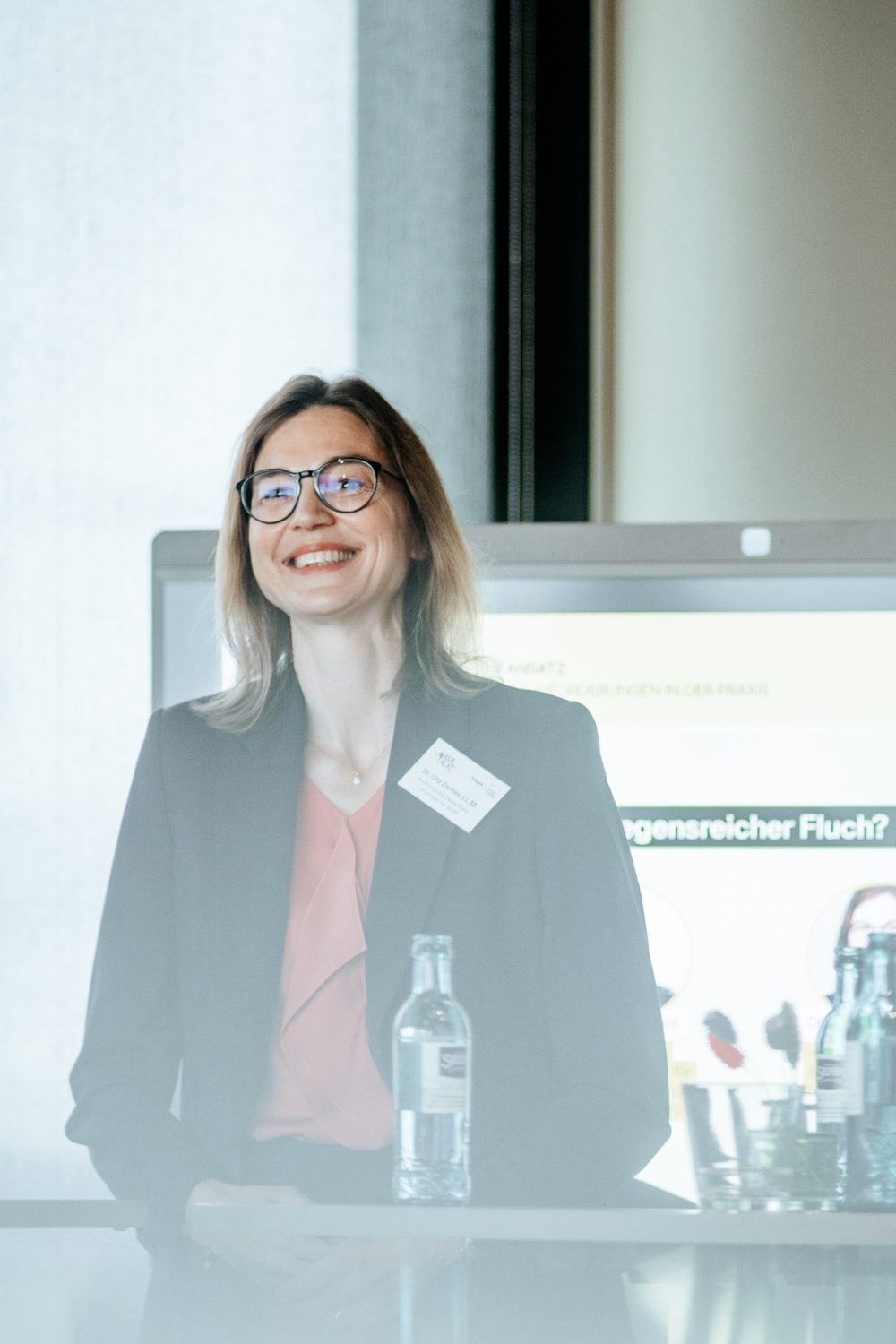 Compliance experts discussing regulation at Hogan Lovells in Frankfurt