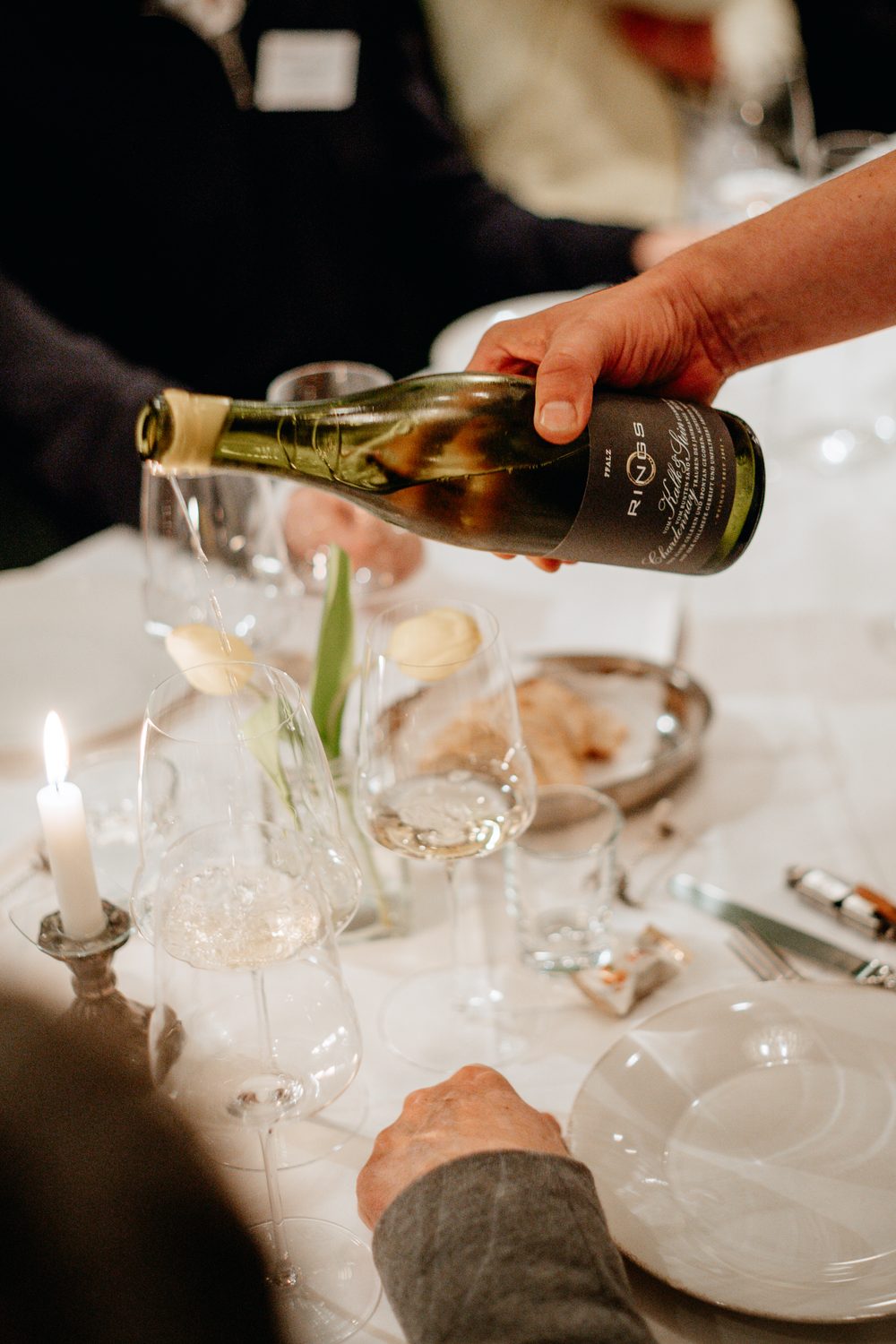 Sommelier holding premium wine selection